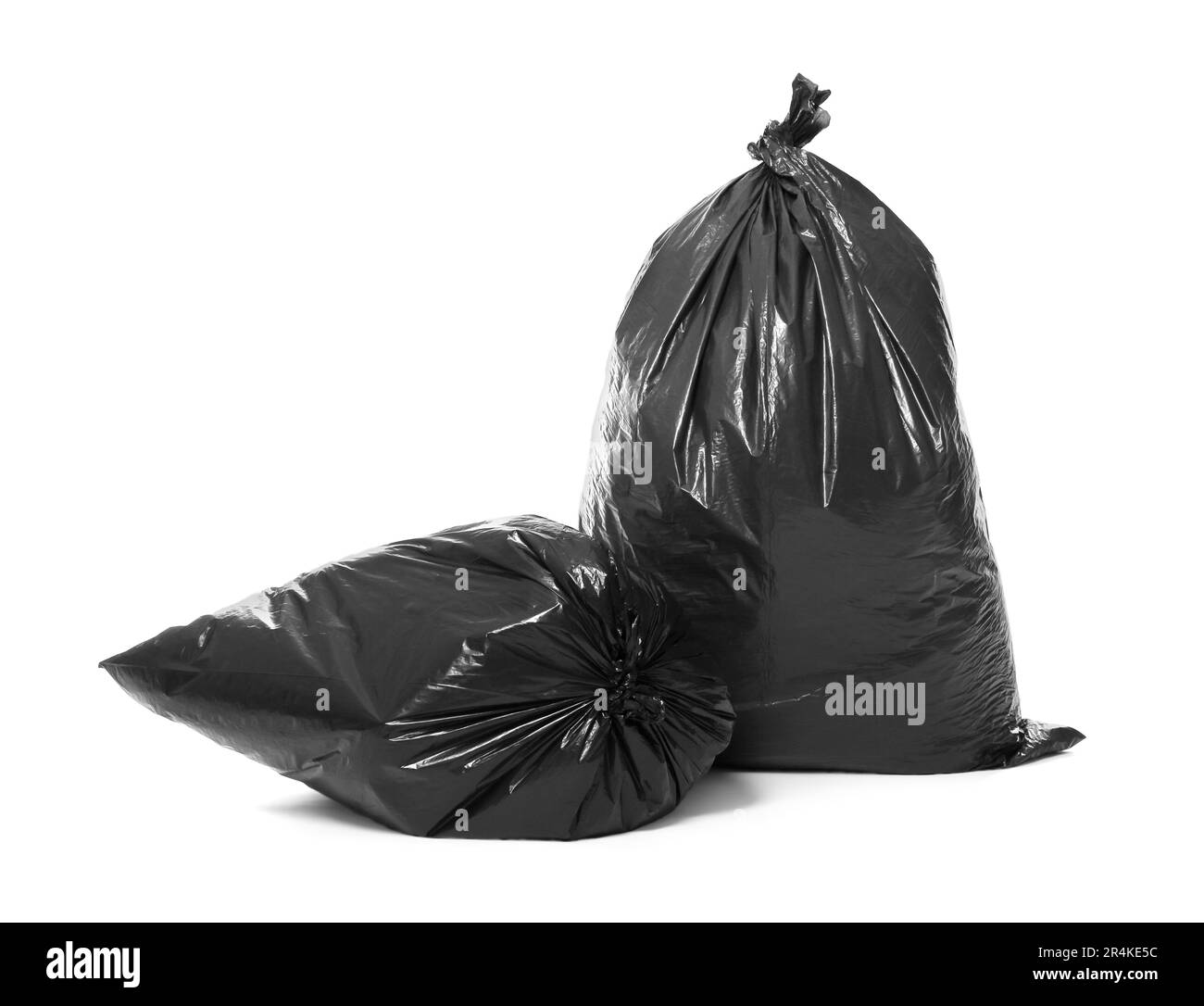 Trash bags full of garbage isolated on white Stock Photo Alamy