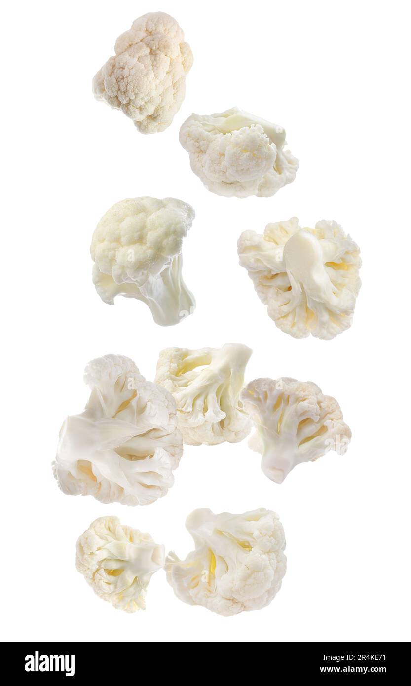 Many fresh cauliflower florets falling on white background Stock Photo