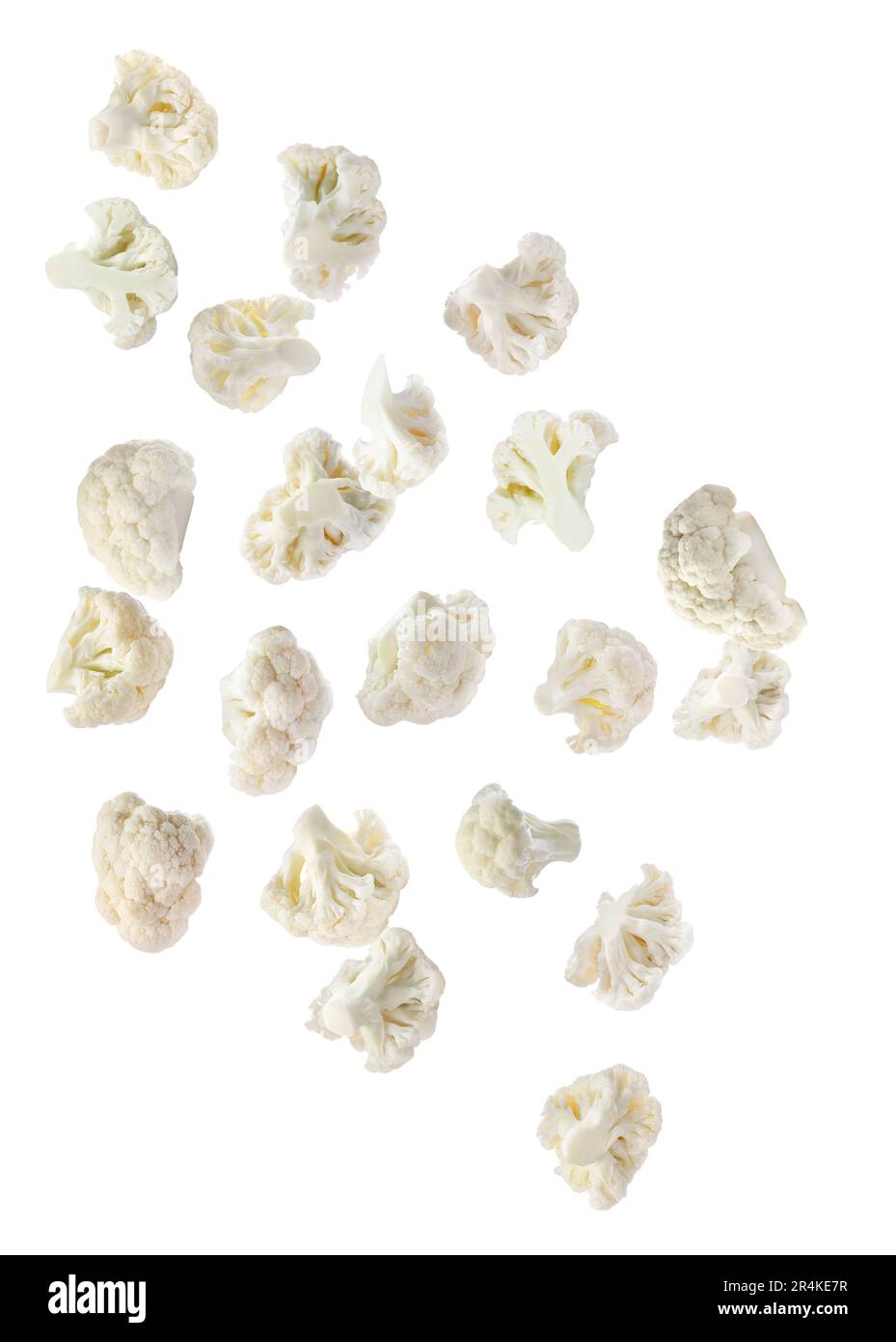 Many fresh cauliflower florets falling on white background Stock Photo