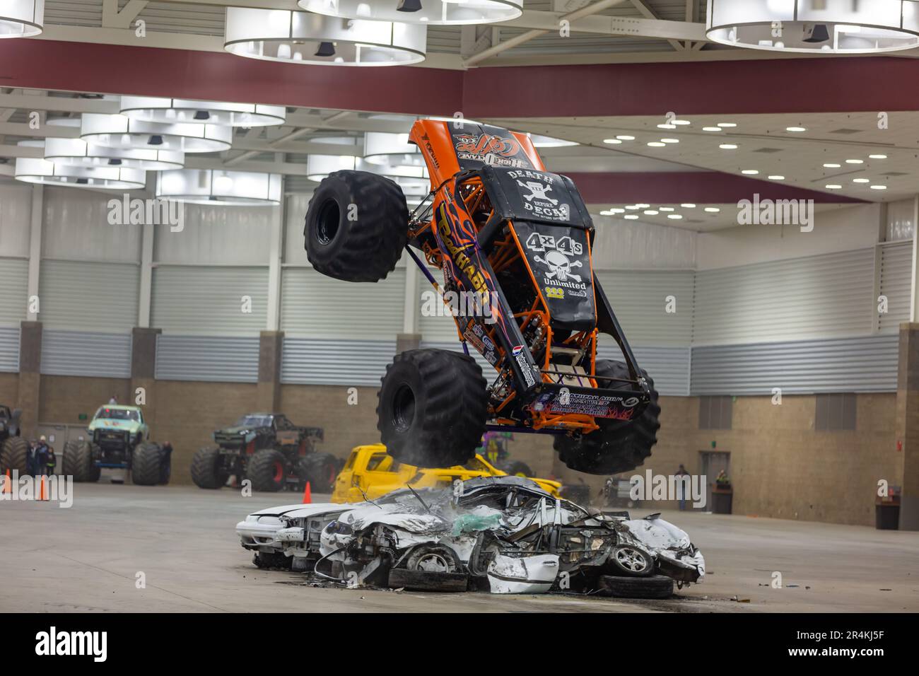 The monster truck 'Bad Habit,' a 1979 Ford F-250, performs at the Allen County War Memorial Coliseum Expo Center in Fort Wayne, Indiana, USA. Stock Photo