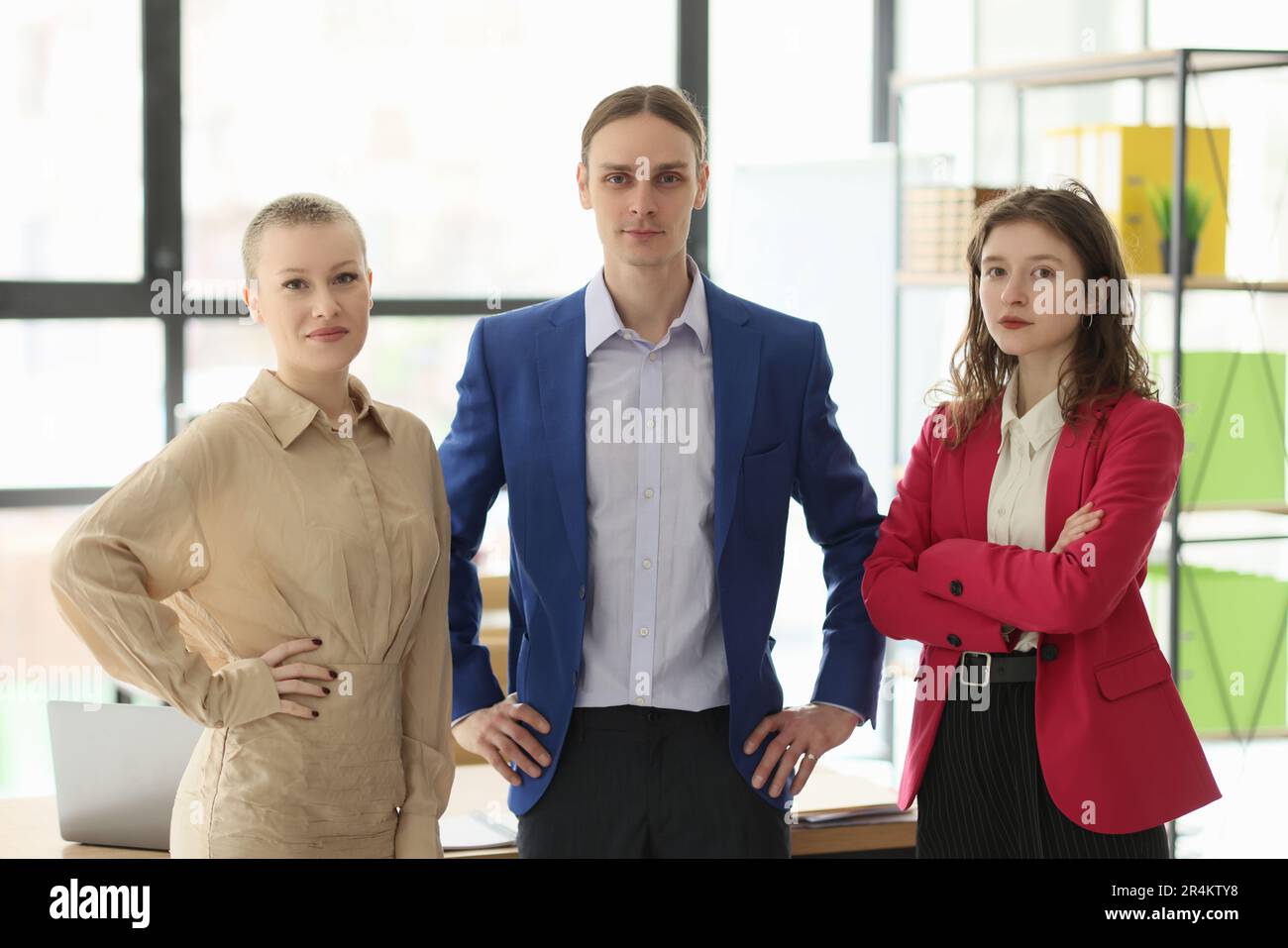 Serious corporate workers team poses in company office Stock Photo - Alamy