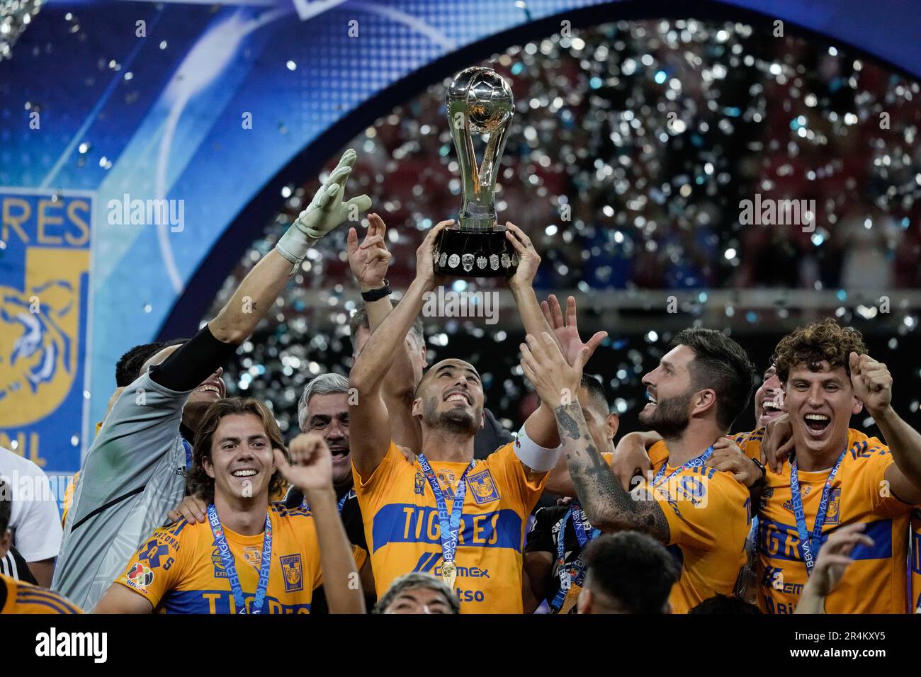 Tigres' captain Guido Pizarro lifts the trophy after winning the