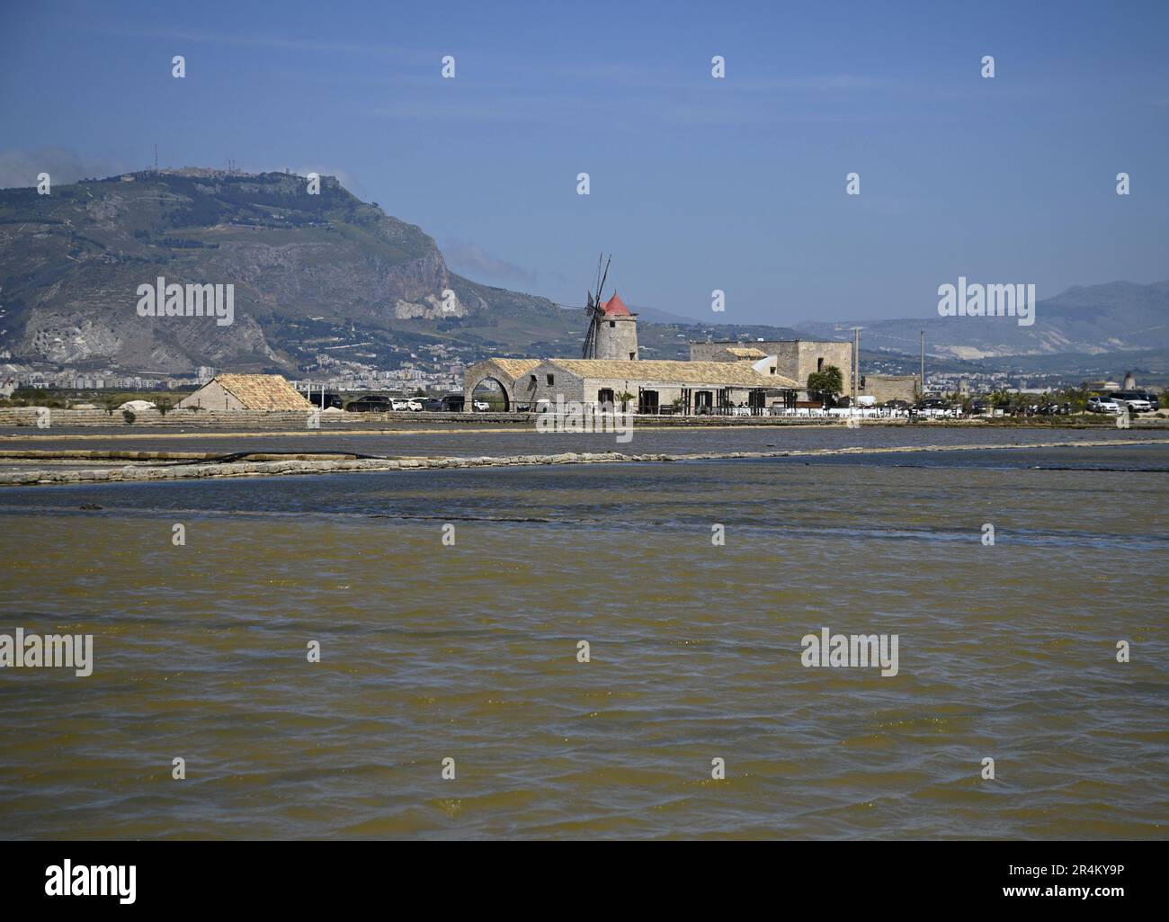 https://c8.alamy.com/comp/2R4KY9P/landscape-with-scenic-view-of-a-traditional-mill-in-the-salt-pan-salina-calcara-nubia-natural-reserve-of-trapani-and-paceco-sicily-2R4KY9P.jpg