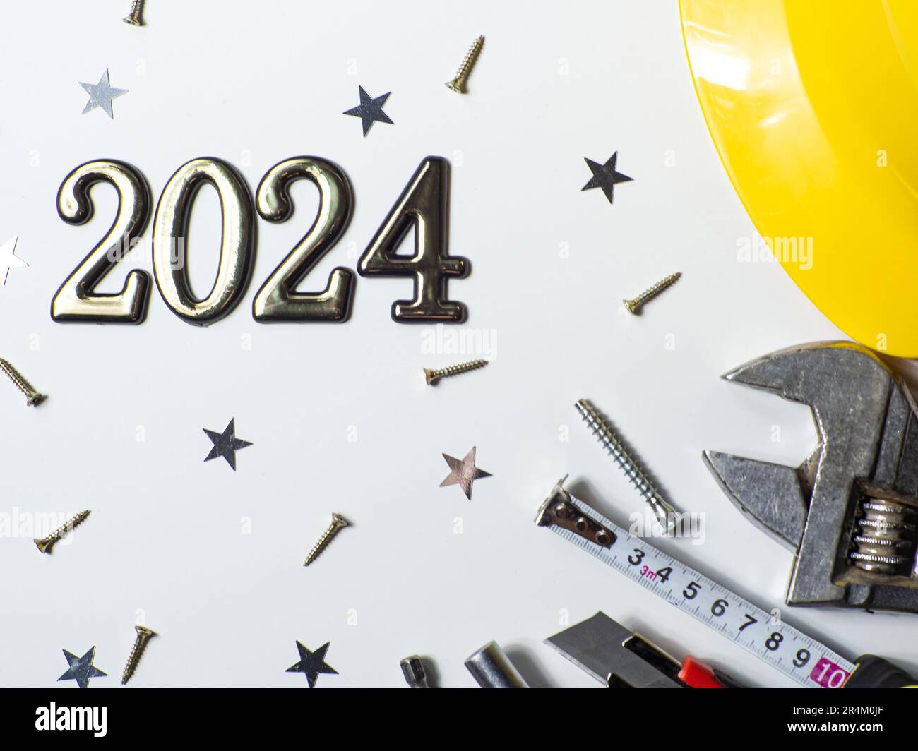 2024 With Construction Tools Hard Hat On White Background With Small   2024 With Construction Tools Hard Hat On White Background With Small Stars And Copy Space New Year And Christmas Construction Greeting Card For Adv 2R4M0JF 