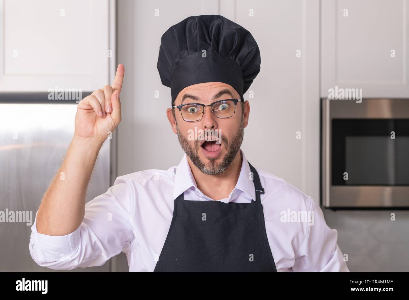 Funny Cooking. Attractive Caucasian Man In The Kitchen Stock Photo, Picture  and Royalty Free Image. Image 65857067.