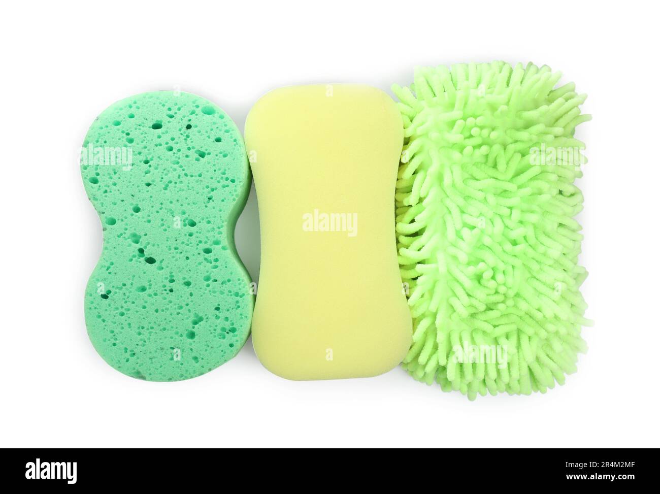 Sponges and car wash mitt on white background, top view Stock Photo Alamy