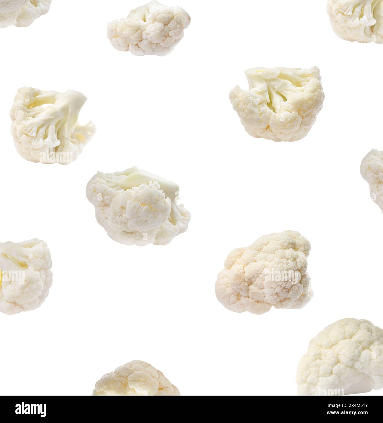 Many fresh cauliflower florets falling on white background Stock Photo