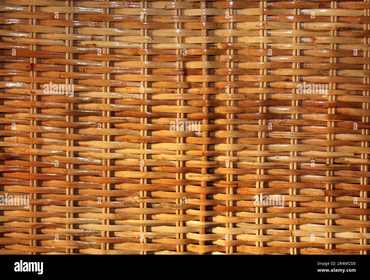 Texture of varnished wicker cane basket. Horizontal or vertical