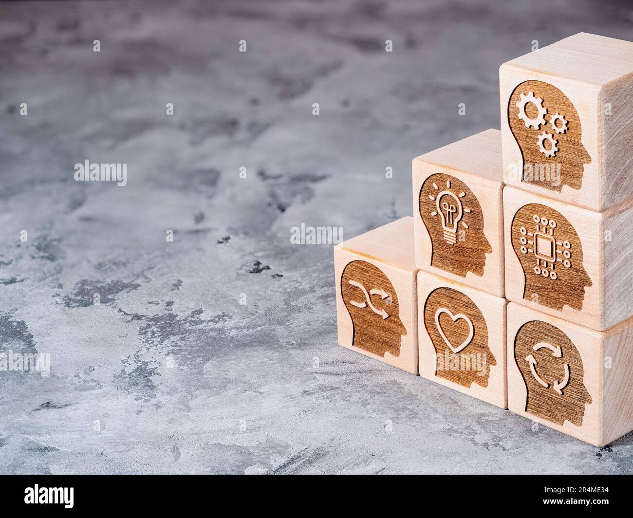 Soft power skills symbols on wooden cubes as a concept of new skill, reskilling and upskilling Stock Photo