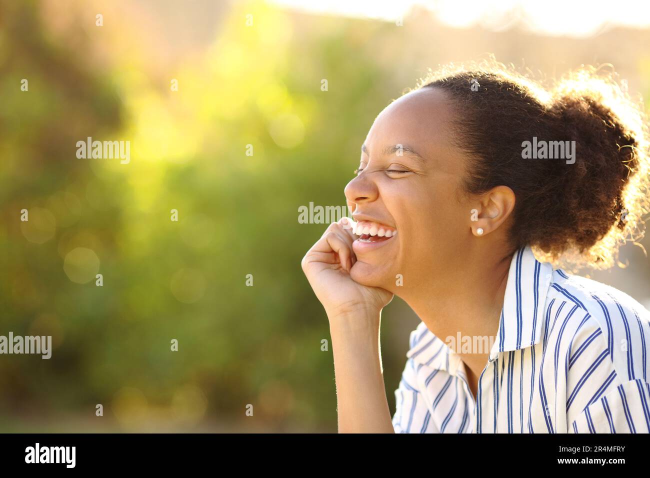 Black woman eyes closed hi-res stock photography and images - Alamy