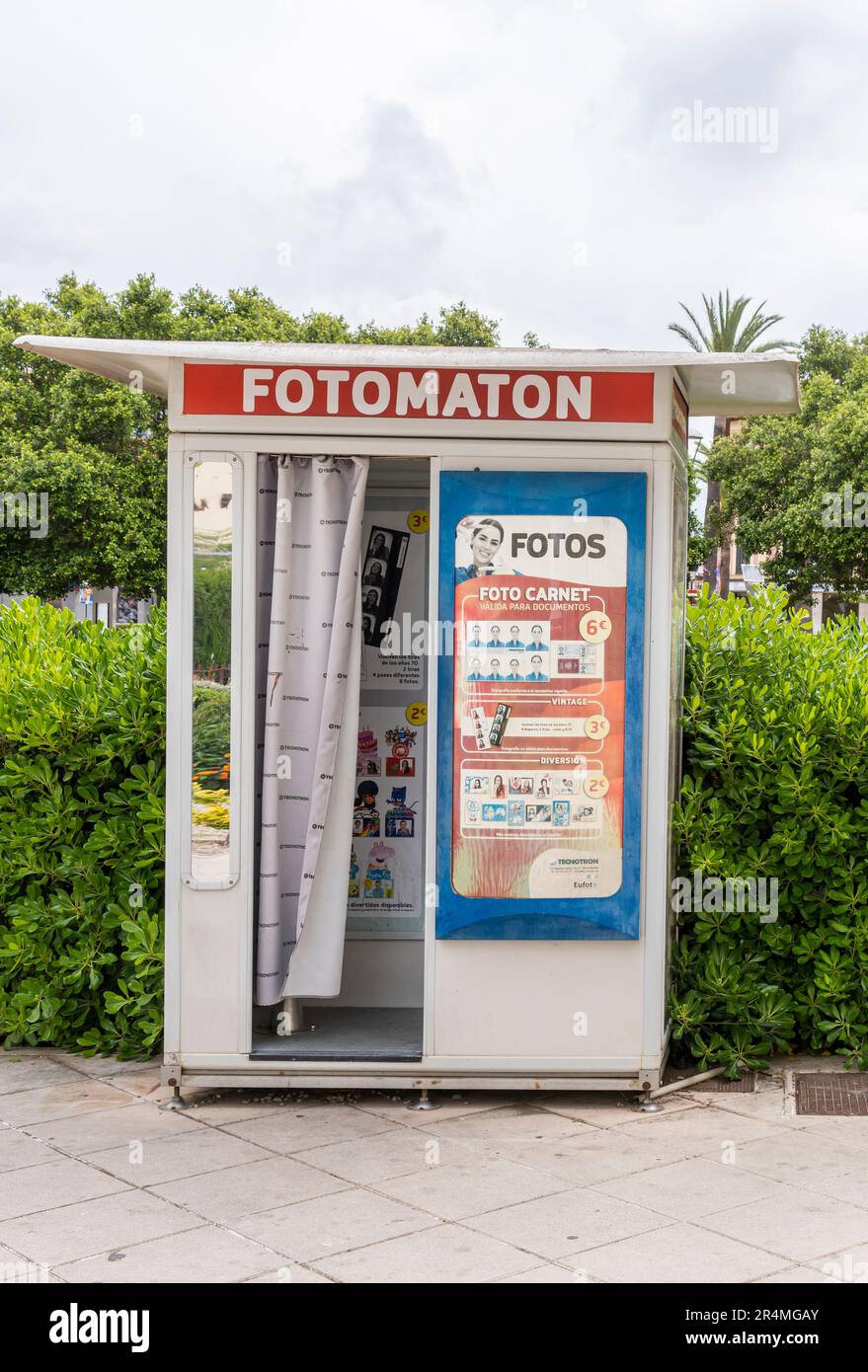 Manacor, Spain; may 13 2023: Photo booth kiosk for passport photos, located on the street. Manacor, island of Mallorca, Spain Stock Photo