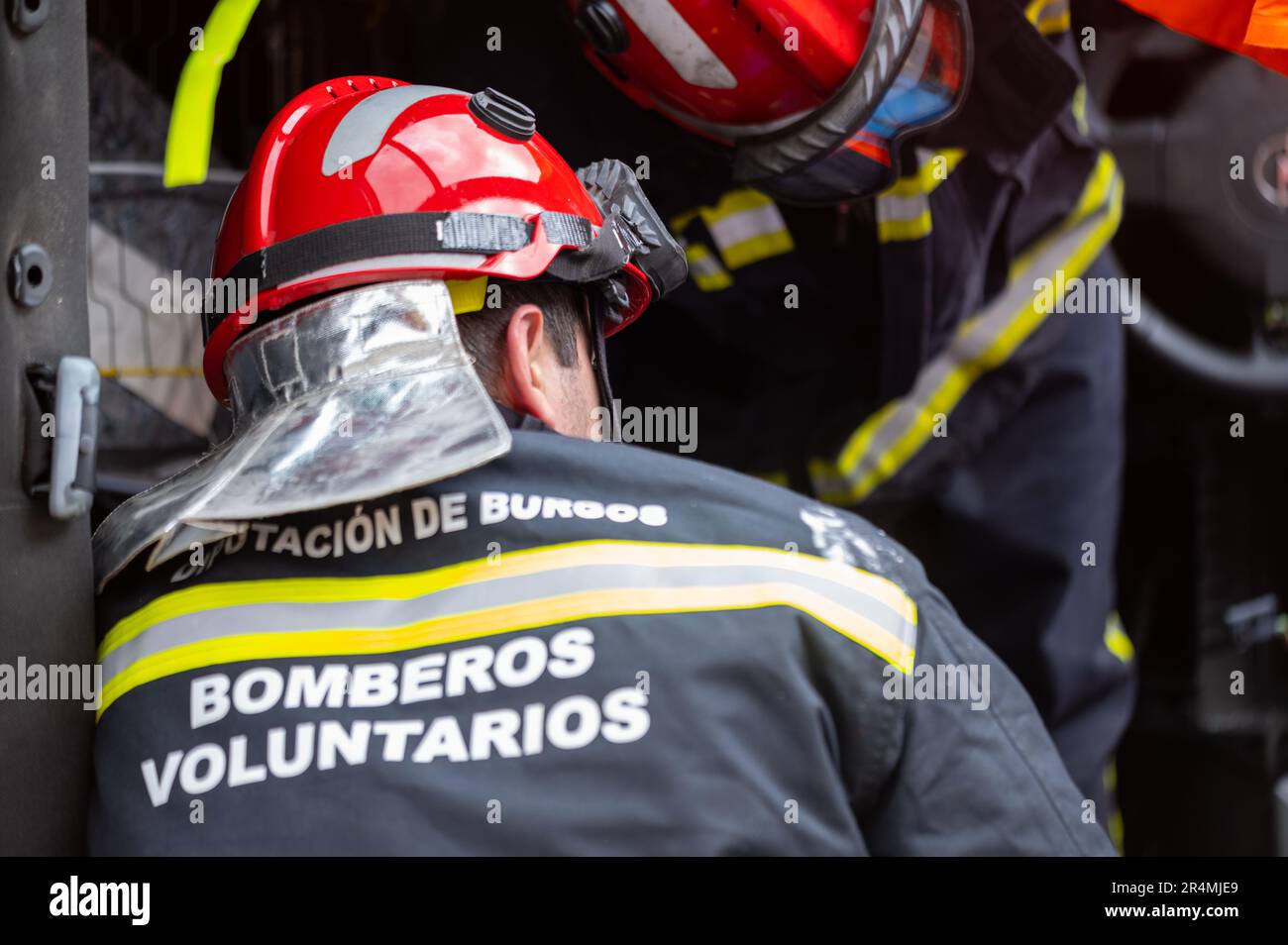 Car Crash Traffic Accident. Firefighters Rescue Injured Trapped Victims. Firemen give First Aid to passengers. High quality photography. Stock Photo