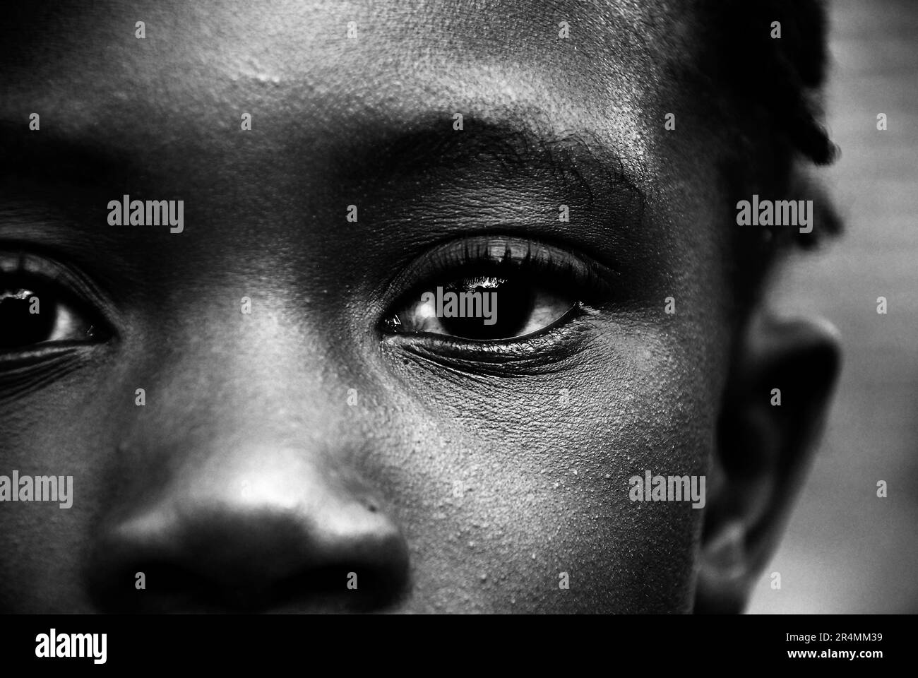 A close portrait of a Mozambican girl in school on Mozambique Island, Mozambique. Stock Photo