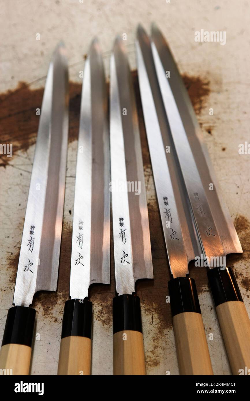 Traditional Japanese knives in a row. Tokyo, Japan. Stock Photo