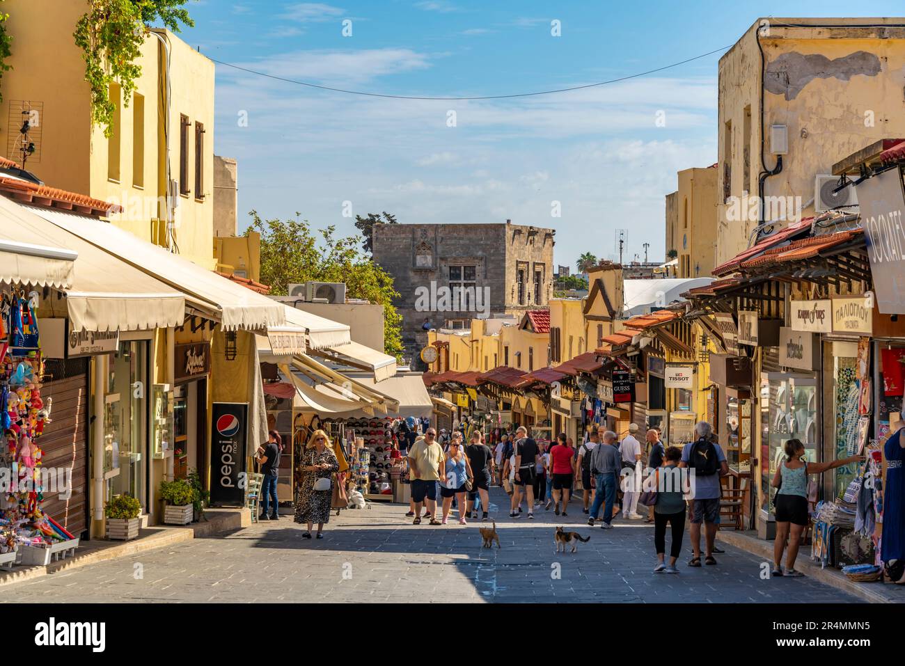 View of cafes and shops on Soktratous, Old Rhodes Town, UNESCO World Heritage Site, Rhodes, Dodecanese, Greek Islands, Greece, Europe Stock Photo