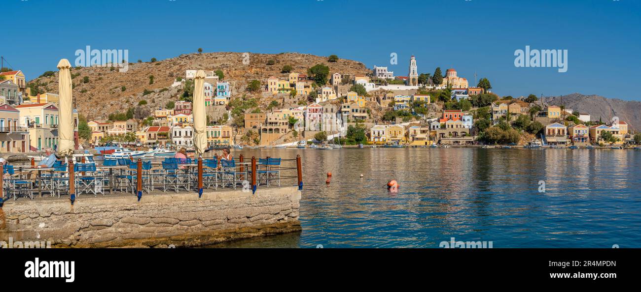 View of The Annunciation Church overlooking Symi Town, Symi Island, Dodecanese, Greek Islands, Greece, Europe Stock Photo