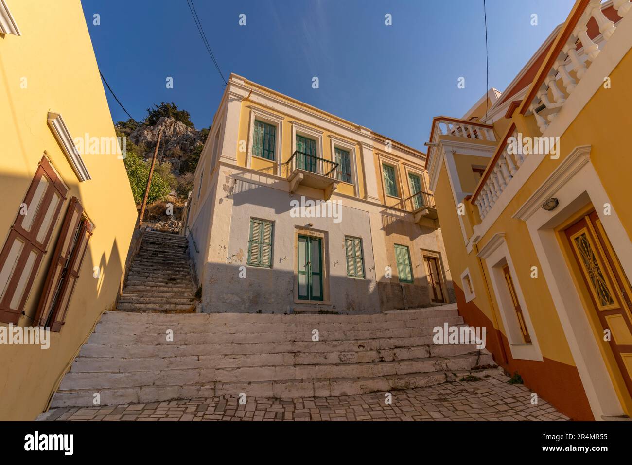 View of buildings in Symi Town, Symi Island, Dodecanese, Greek Islands, Greece, Europe Stock Photo