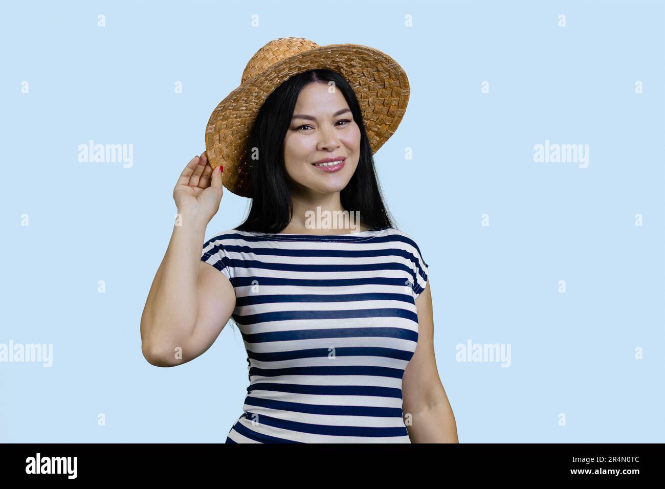 Portrait of beautiful young asian woman wearing straw hat wide brim ...