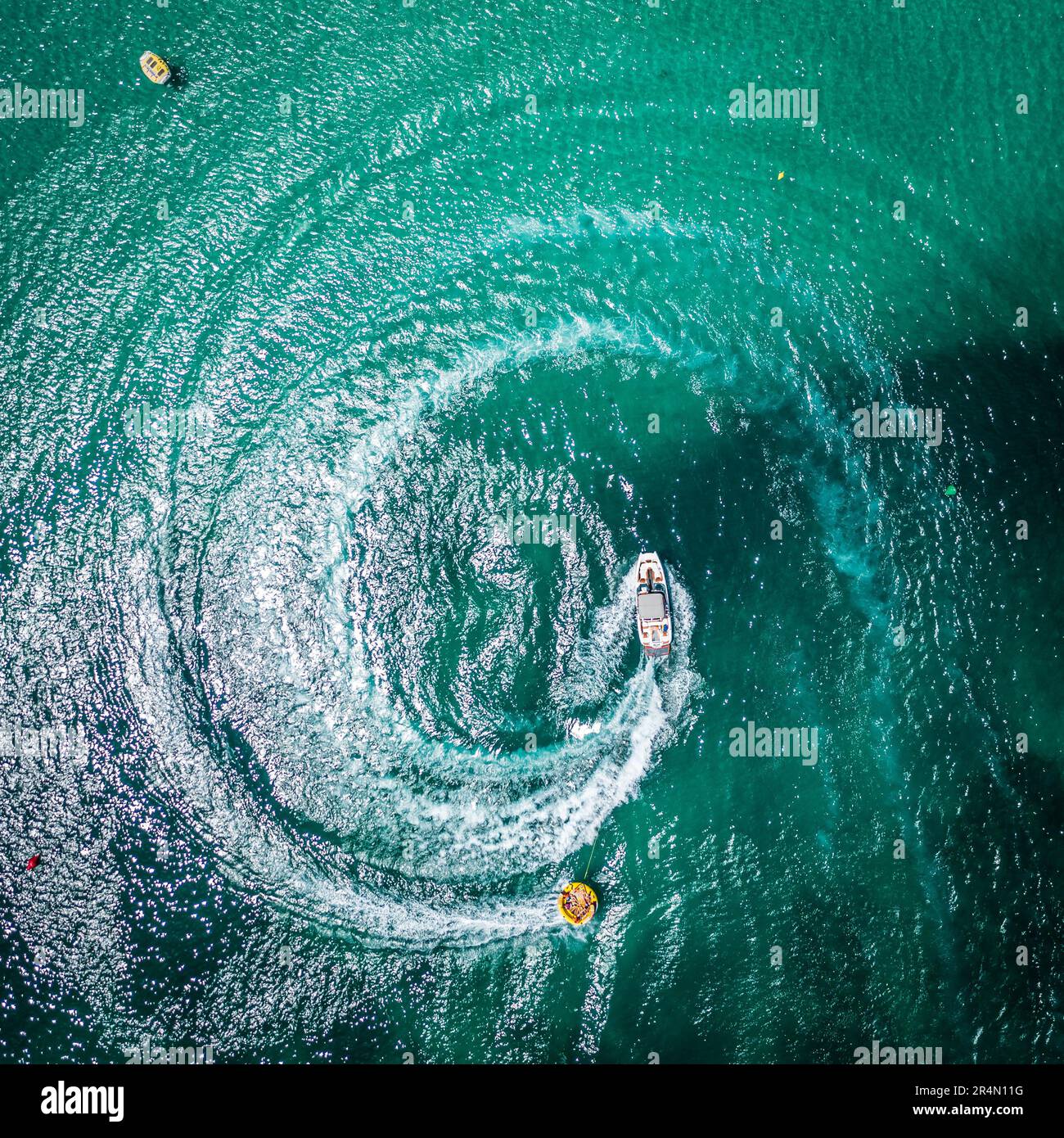 Aerial view on motorboat and jetski on the sea surface Stock Photo - Alamy