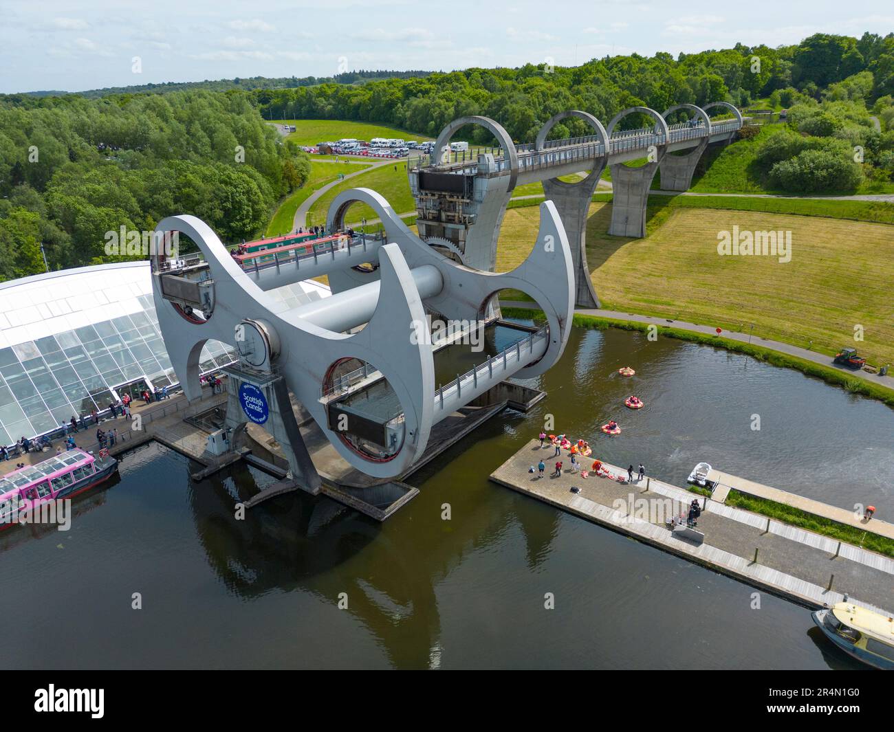 Aerial view from drone of Falkirk Wheel rotating boat lift on Forth and Clyde and Union Canals in Falkirk, Scotland, UK Stock Photo