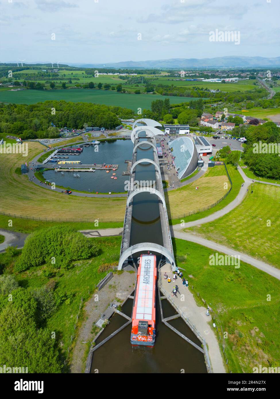 Aerial view from drone of Falkirk Wheel rotating boat lift on Forth and