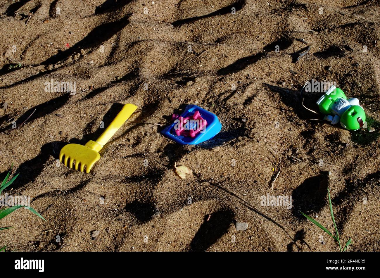Old toys in the sandbox, russia Stock Photo