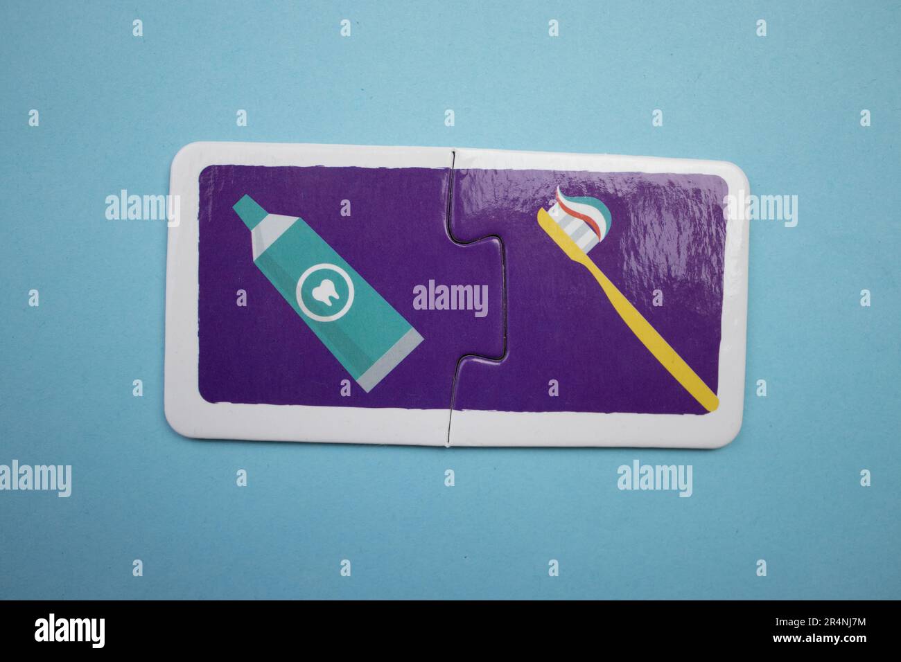 Information puzzles, photographed from above, placed on a blue