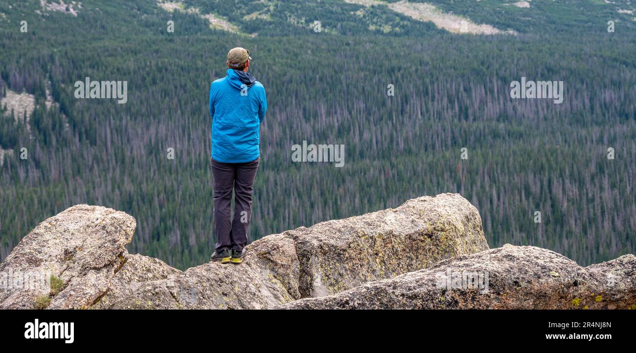 Man overlooks rocky mountain hi-res stock photography and images - Alamy