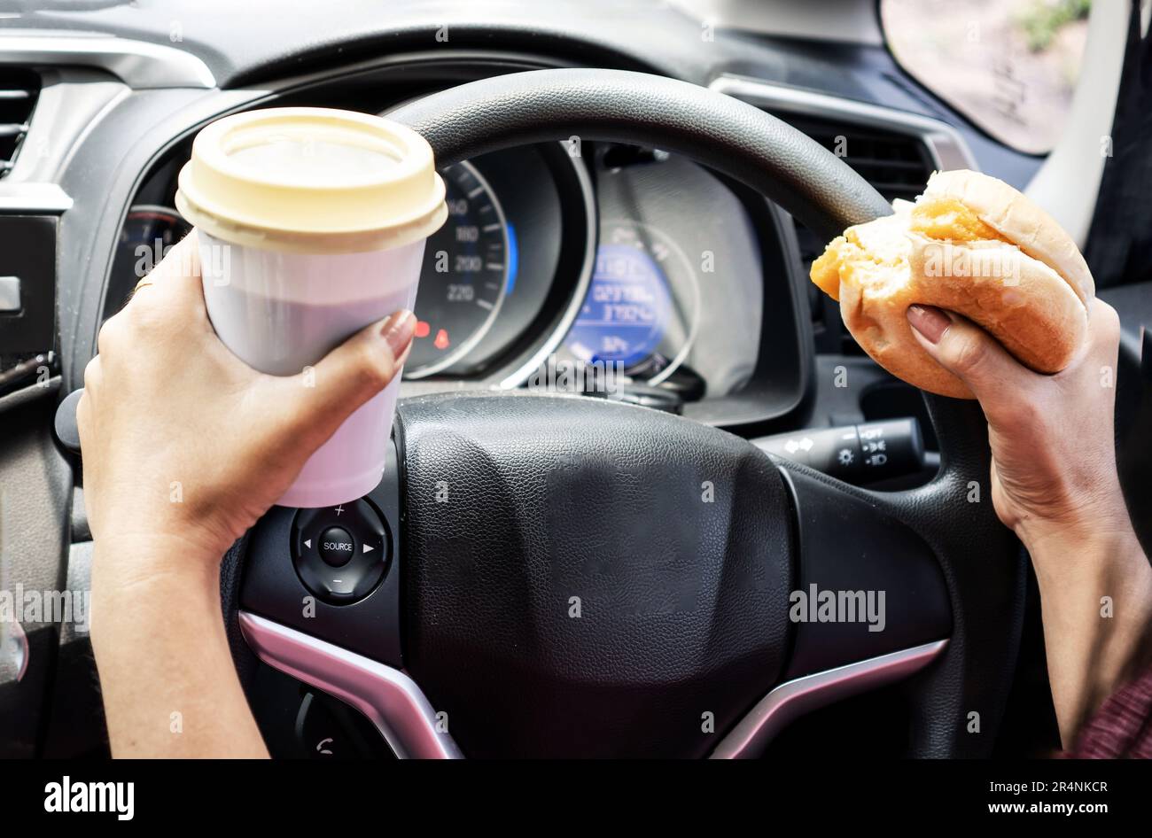 forbidden and perilous with closeup of woman's hand, holding burger