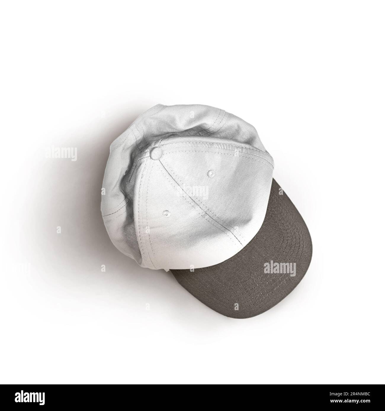 White and black snapback cap mockup on a grey background. Stock Photo