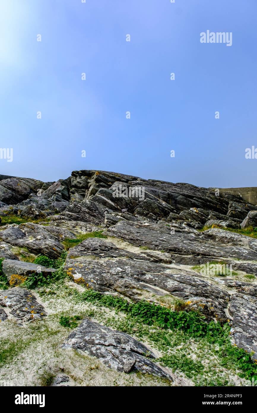 Olberg; Olbergstranden; Raege; Norway; May 20 2023, Weathered Mountain Hillside With Rocky Outcrops And Grass Exposed To The Harsh Elements Of Western Stock Photo