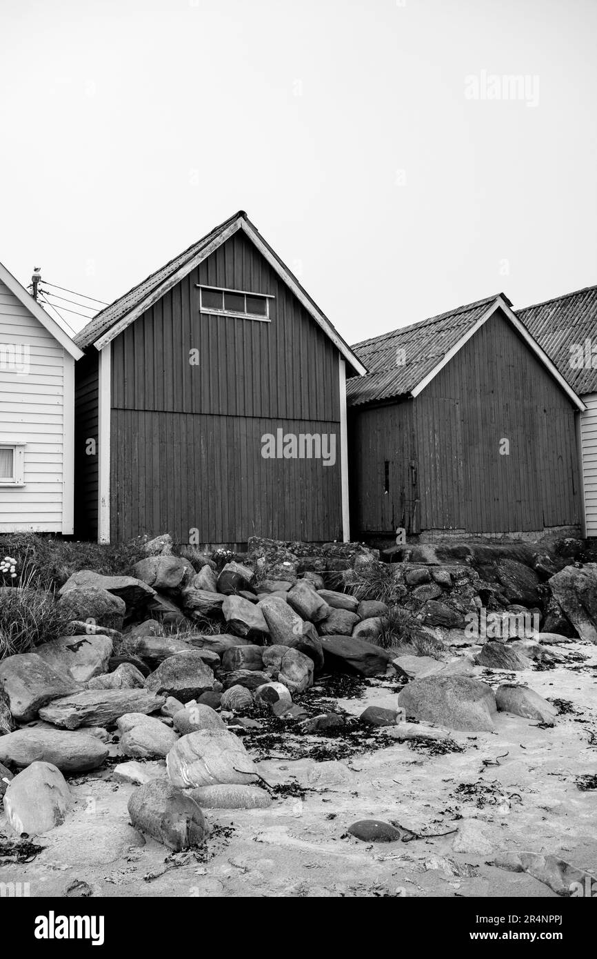 Olberg; Olbergstranden; Raege; Norway; May 20 2023, Black And White Shot Traditional Coastal Beach Huts With No People Western Norway Stock Photo