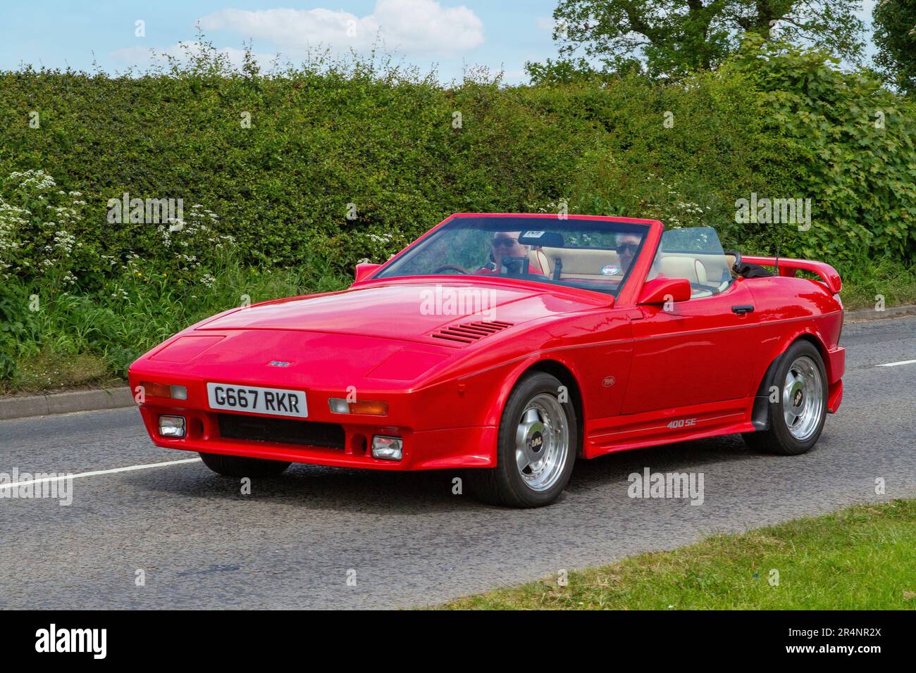 TVR Tasmin red petrol soft top convertible cabriolet Classic & vintage cars and motorcycles are delighted to return to Capesthorne Hall Stock Photo