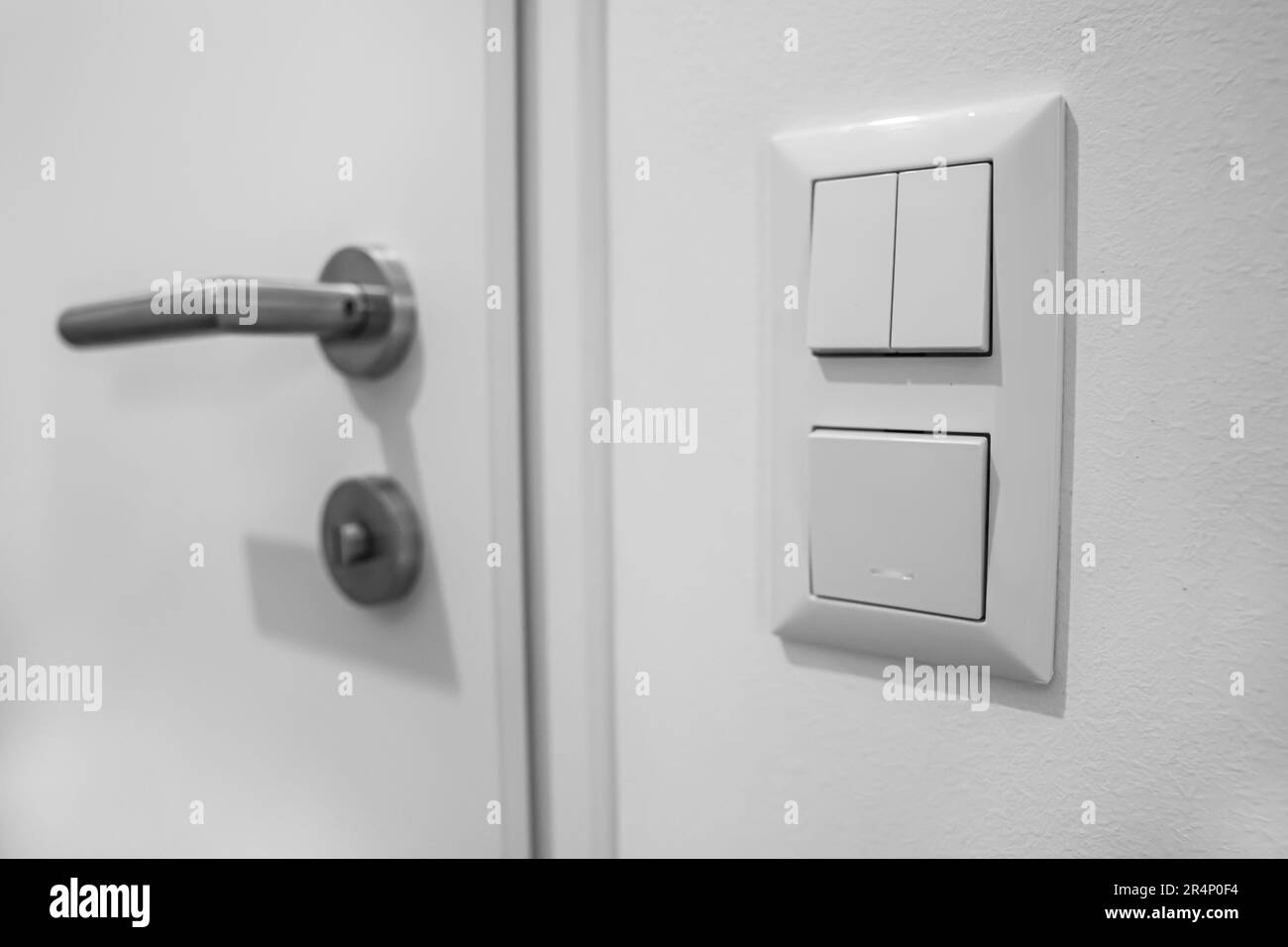 Modern switches on light wall Stock Photo Alamy