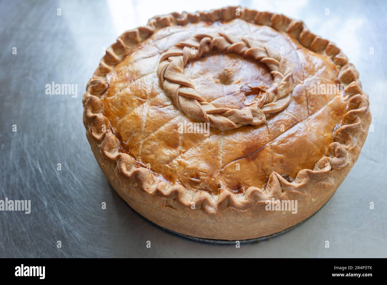 Backlight 9 Inch Traditional Pork Pie on metal table side view closeup ...