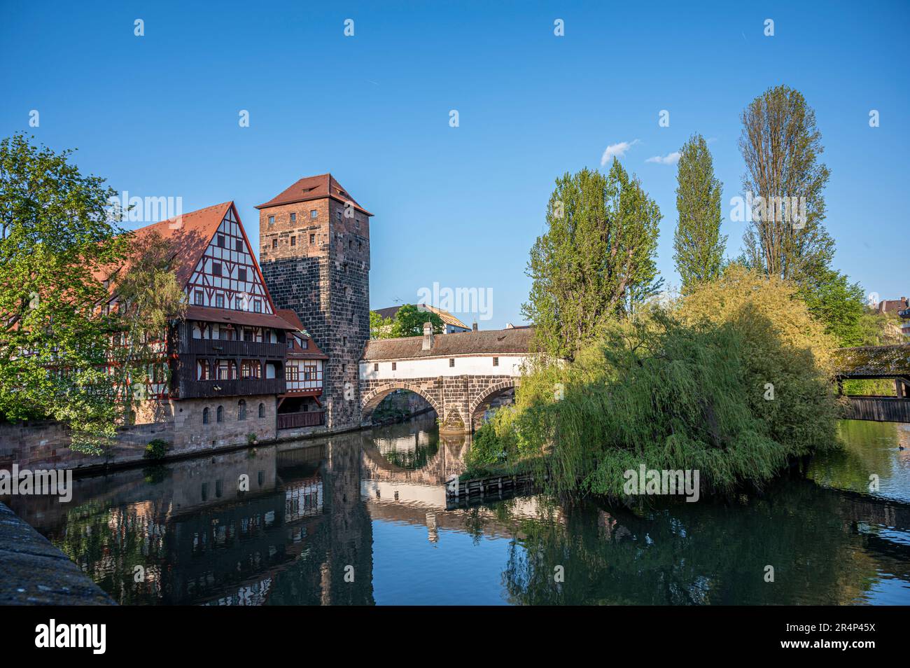 Old medieval bridge over Pegnitz river in Nuremberg, Germany. Hangman's Bridge. Stock Photo