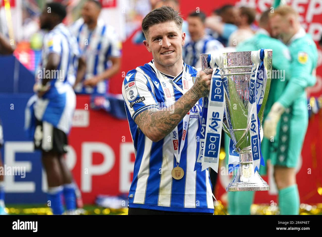 Sheffield Wednesday's Josh Windass celebrate with the trophy following