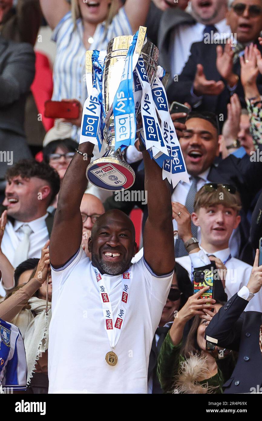 Darren Moore manager of Sheffield Wednesday lifts the League One Play