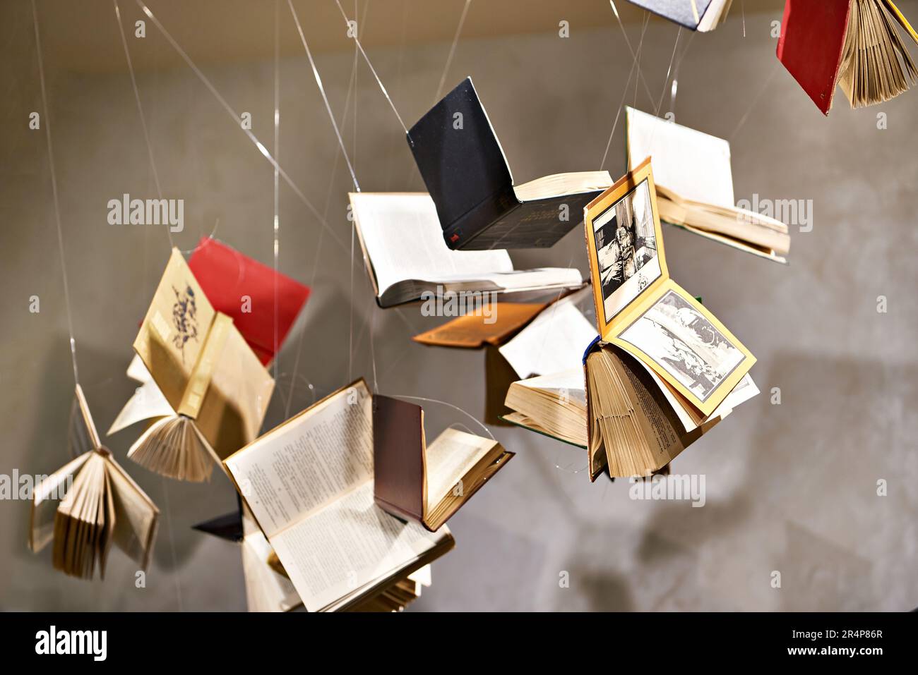 Books hanging in the air as an art object Stock Photo