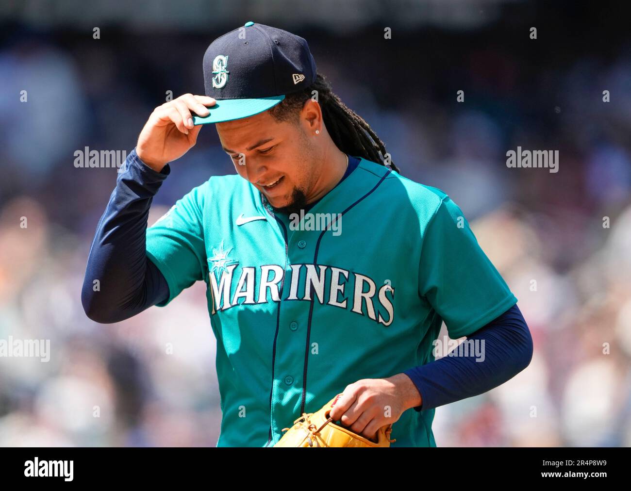 Seattle Mariners starting pitcher Luis Castillo walks off the field after facing the Pittsburgh Pirates in a baseball game Saturday, May 27, 2023, in Seattle. (AP Photo/Lindsey Wasson) Stock Photo