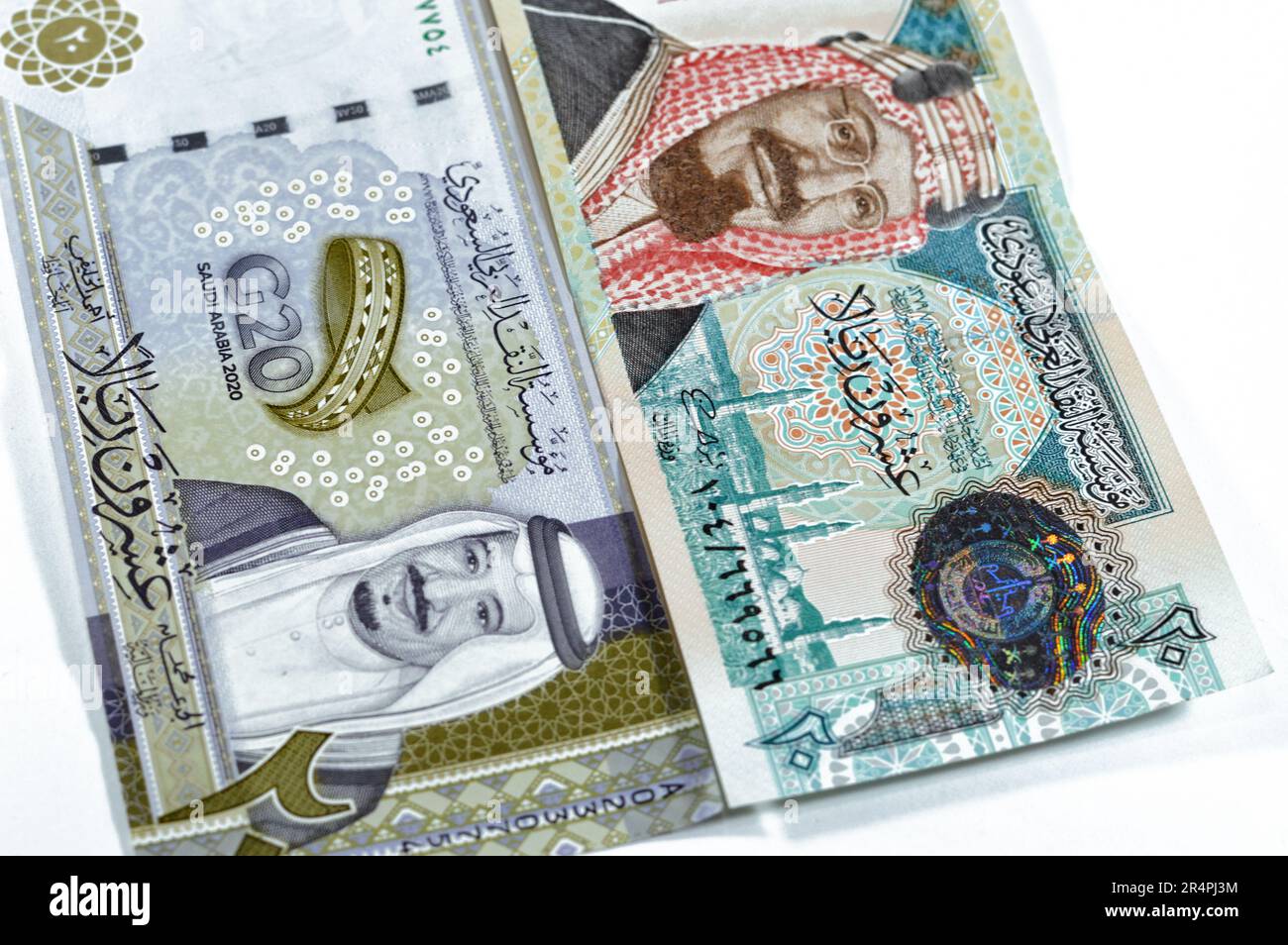 20 SAR Twenty Saudi Arabia Riyals Banknotes Currency Bill Money An Old   20 Sar Twenty Saudi Arabia Riyals Banknotes Currency Bill Money An Old One With King Abdulaziz Photo Quba Mosque Light Mountain And New One With Kin 2R4PJ3M 