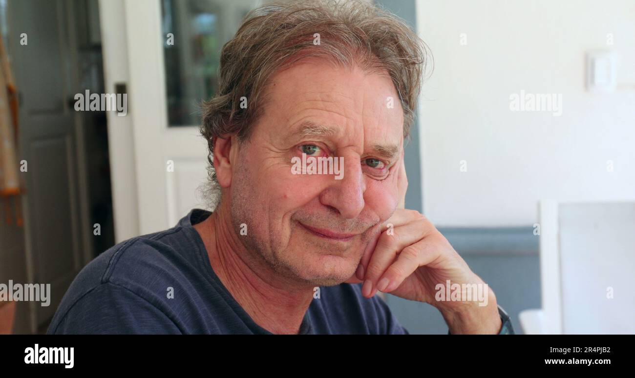 Handsome older man smiling face hi-res stock photography and images - Alamy