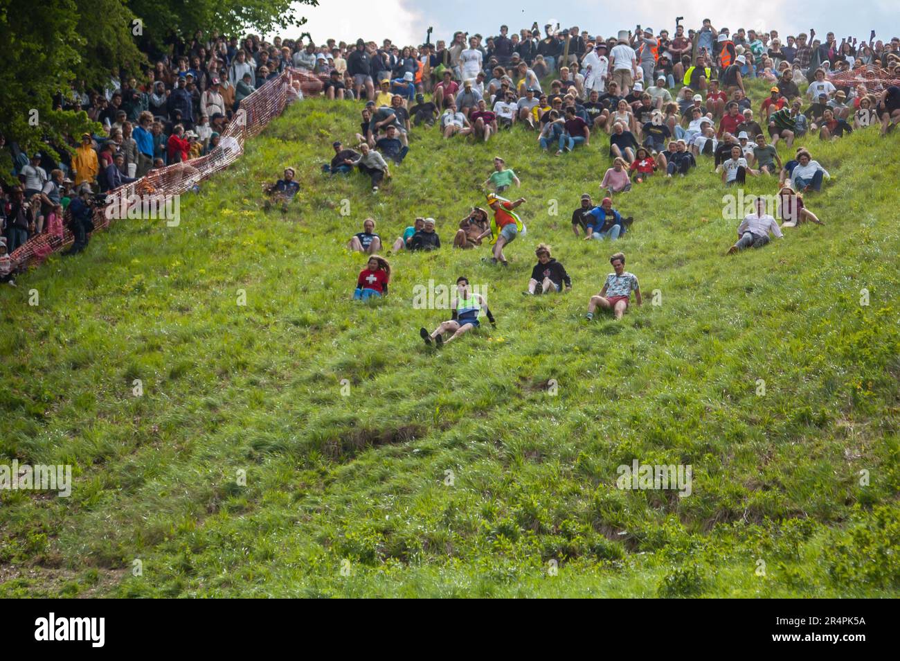 Cooper's Hill, Brockworth, England. 29th May, 2023. People taking part in Cooper's Hill cheese-rolling event 2023. Credit: Jessica Girvan/Alamy Live News Stock Photo