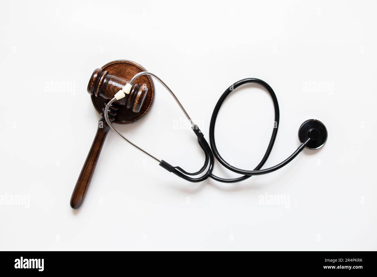 Judicial gavel and stethoscope on a white background, medical court, law and justice Stock Photo