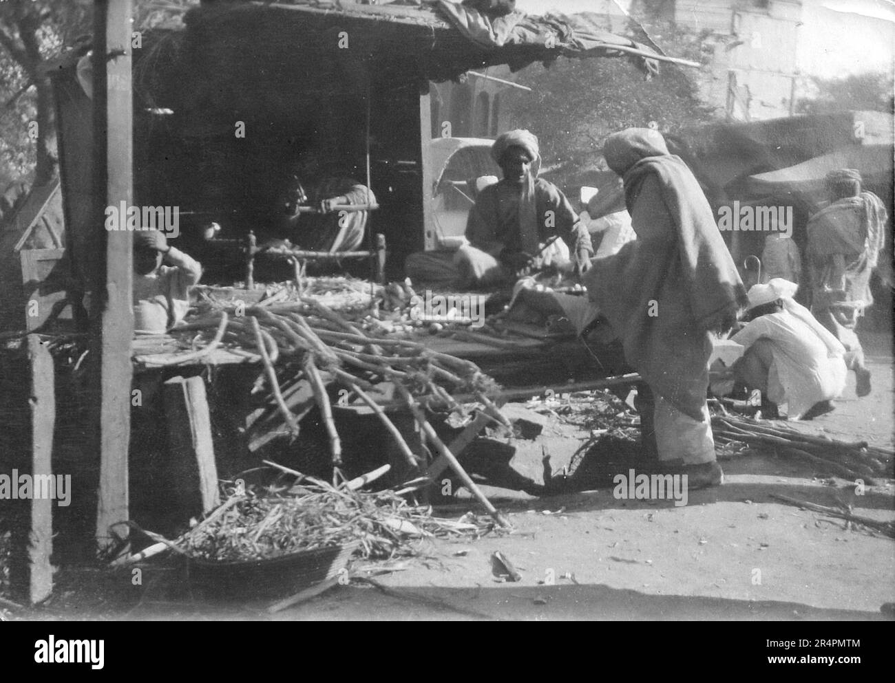 Southern India, parts of which are now known as Pakistan: Sugar cane wallah, Rowshera, a town on the banks of the Manawer River. From a series taken from the original first World War snapshot photo taken in India, c1917-19. The originals were small photographs which might look poor if enlarged too much. Stock Photo