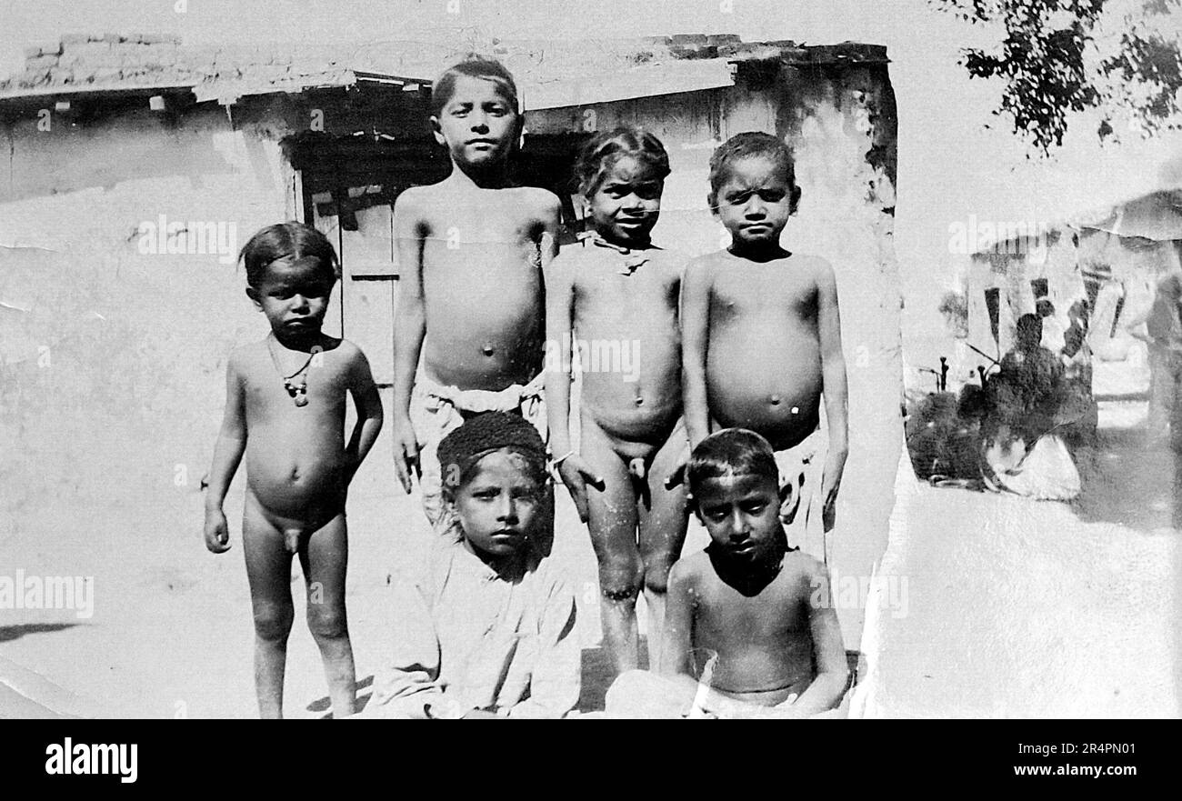 Southern India, parts of which are now known as Pakistan: Group of native children, Mullan. From a series taken from the original first World War snapshot photo taken in India, c1917-19. The originals were small photographs which might look poor if enlarged too much. Stock Photo