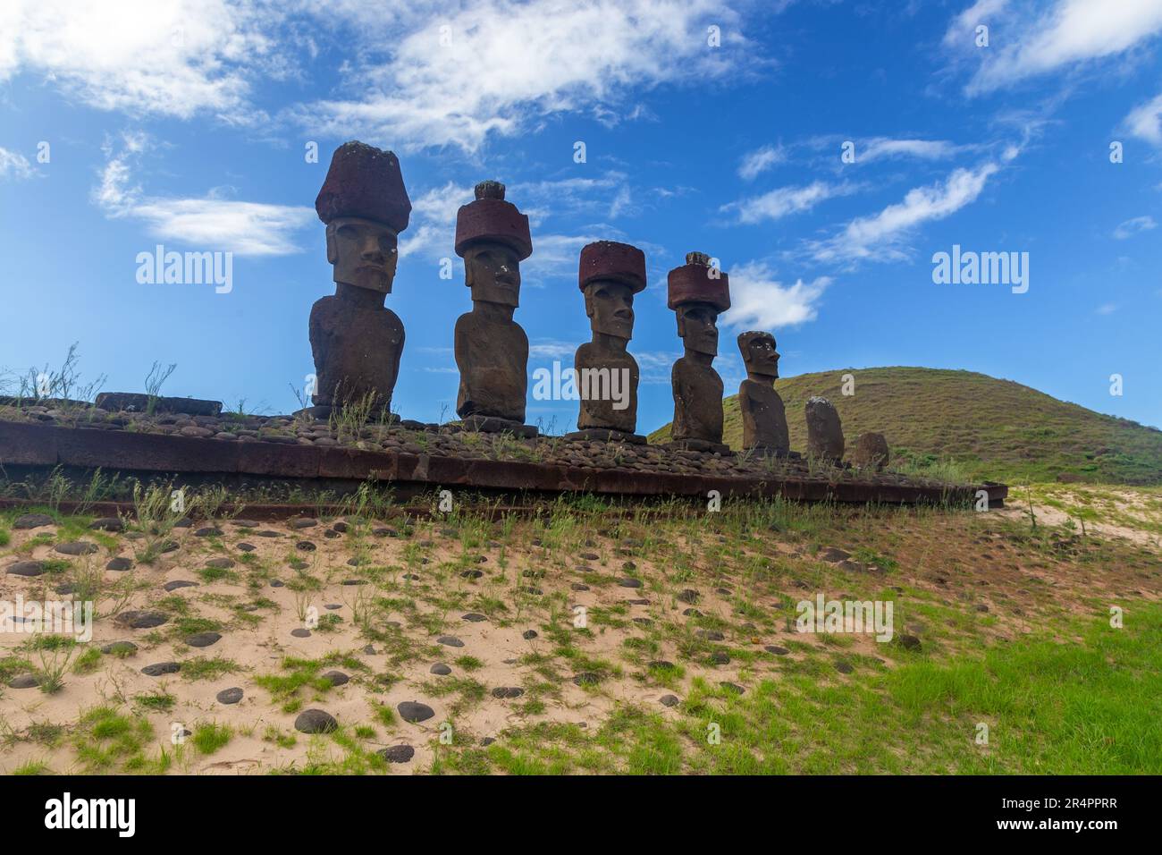 Moai Sculptures Row on Platform, Side View, Blue Skyline. Anakena Beach
