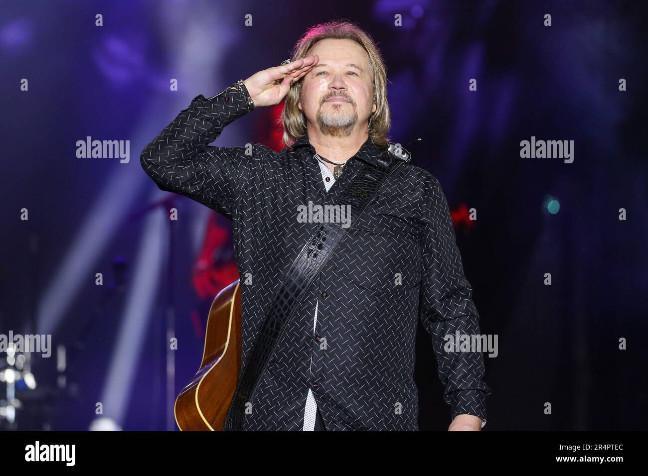 Denham Springs, LA, USA. 27th May, 2023. Travis Tritt salutes the crowd in honor of Memorial Day during Day 1 of the 2023 Cajun Country Jam Memorial Day Festival at PADS North Park in Denham Springs, LA. Jonathan Mailhes/CSM(Credit Image: © Jonathan Mailhes/Cal Sport Media). Credit: csm/Alamy Live News Stock Photo