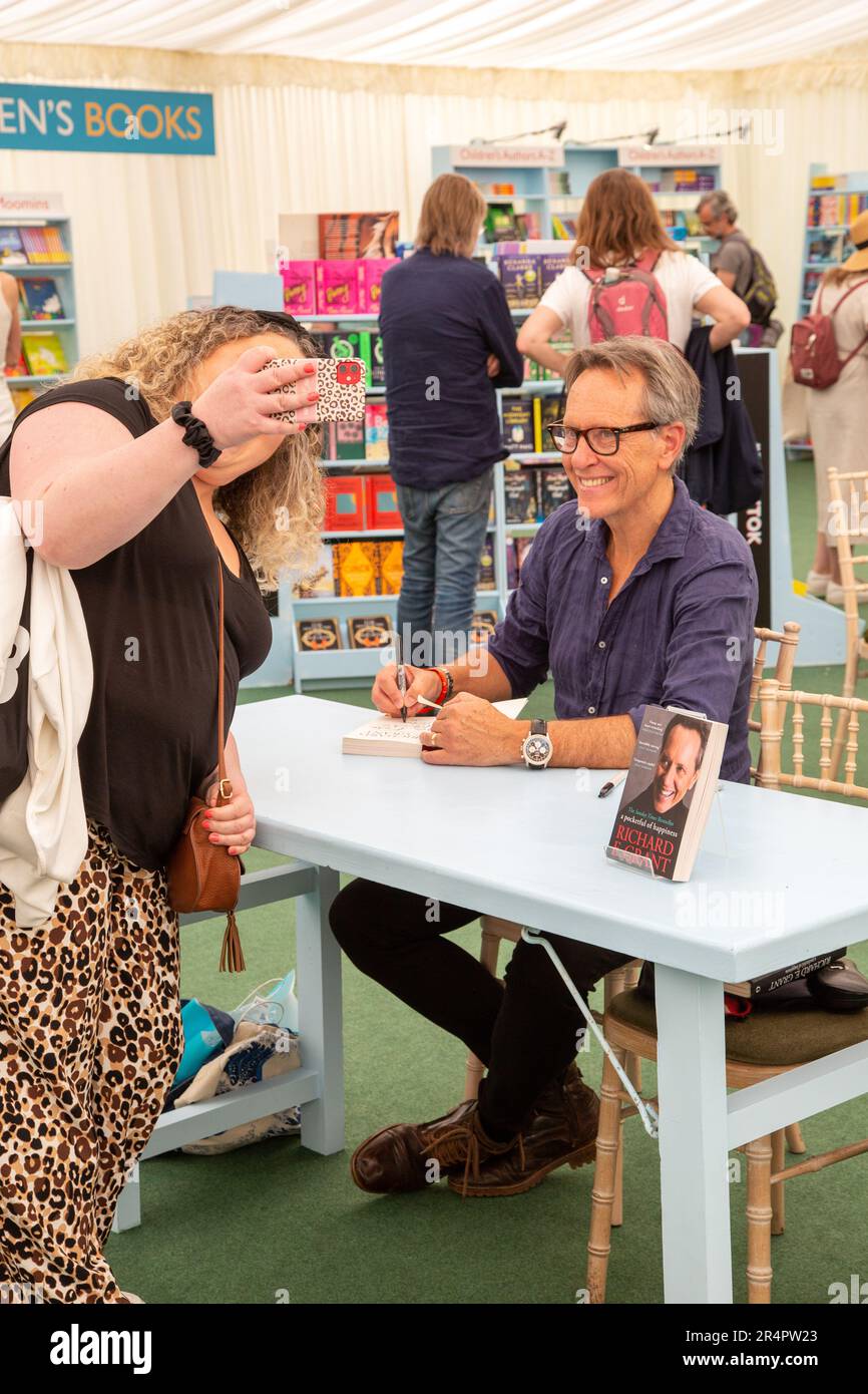 Film star Richard E Grant signing copies of his latest book at the 2023