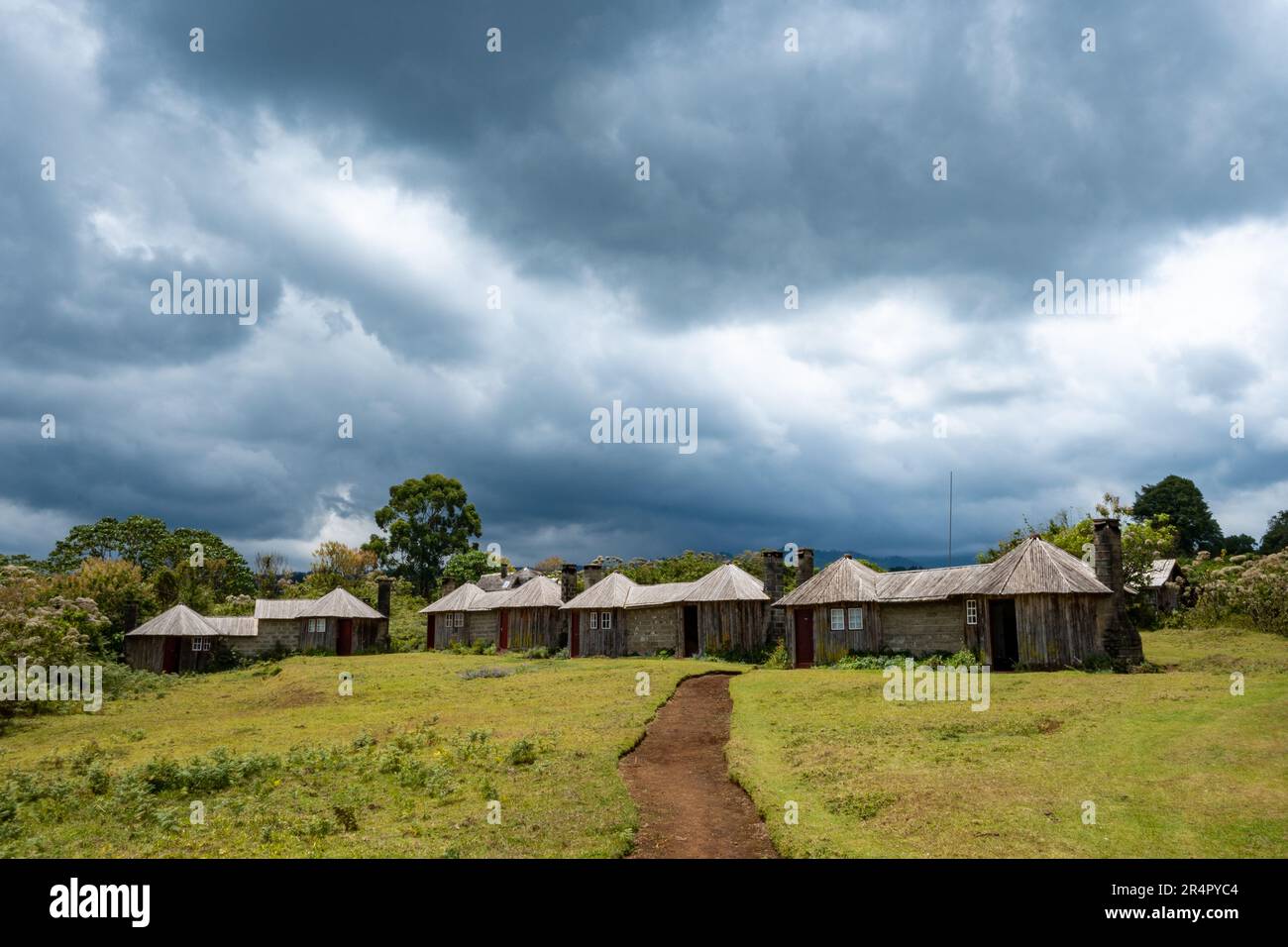 Guest houses in traditional rounded hut style. Mount Kenya National Park, Kenya, Africa Stock